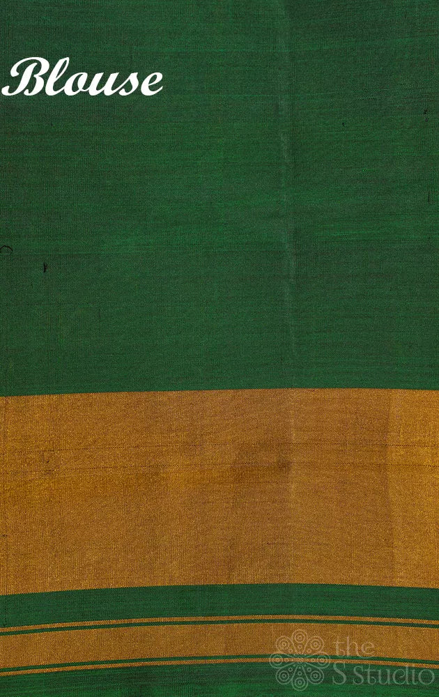Peach patola saree with green border and all over design