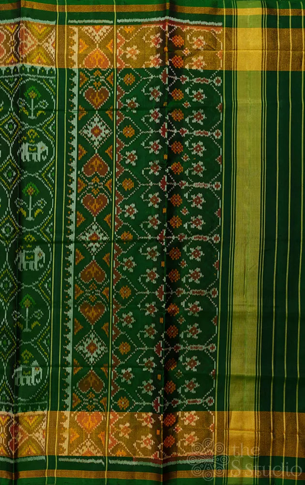 Green rajkot patola saree with all over ikkat design and tissue border