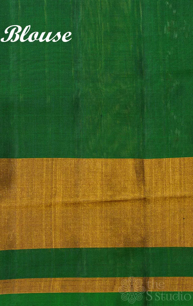 Green rajkot patola saree with all over ikkat design and tissue border