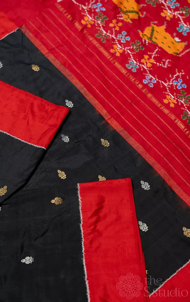 Black ikkat silk saree with floral zari motifs