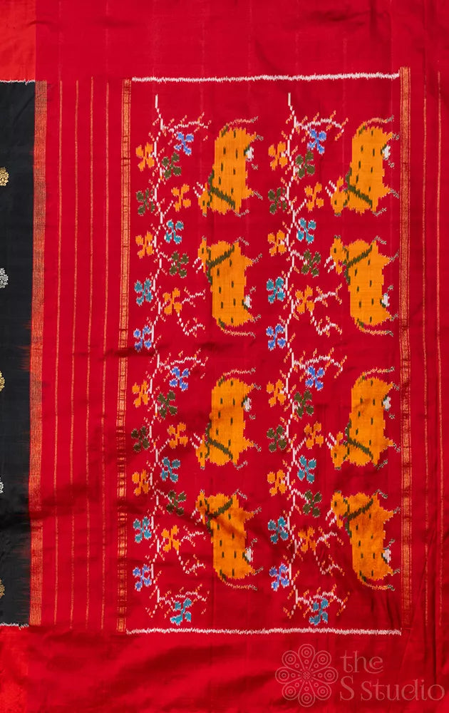 Black ikkat silk saree with floral zari motifs
