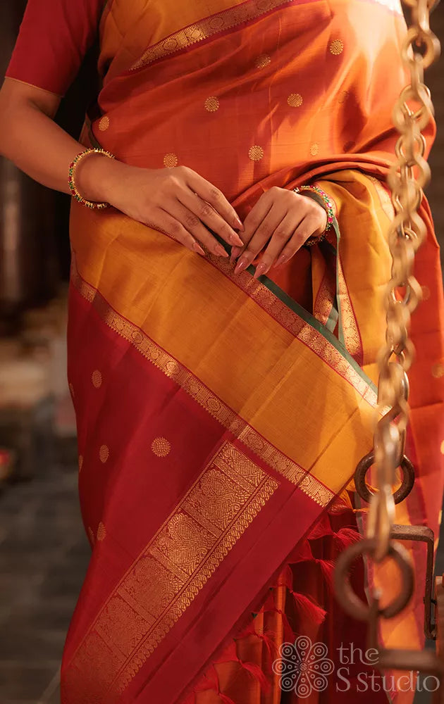 Rust kanchipuram silk saree with rettaipet border