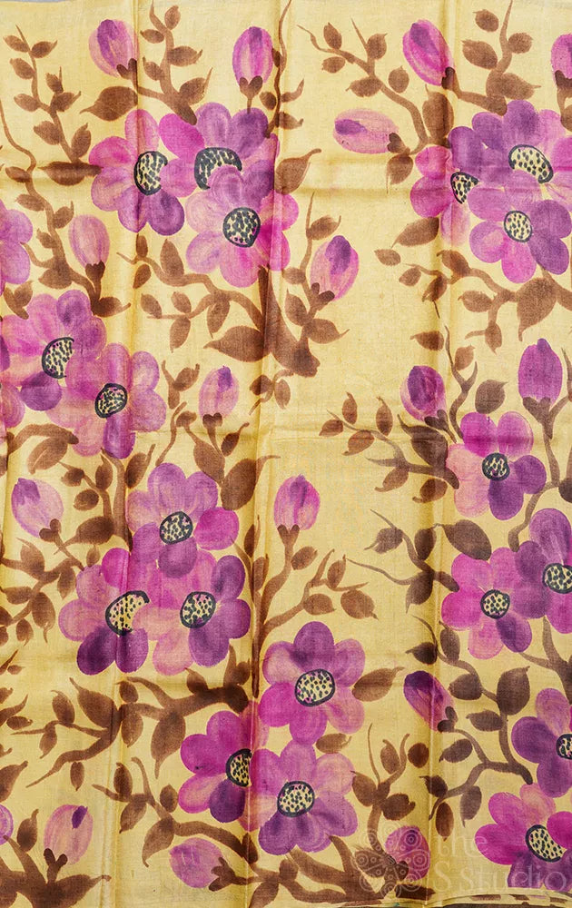 Light yellow tussar silk saree with floral batik prints and hand painting