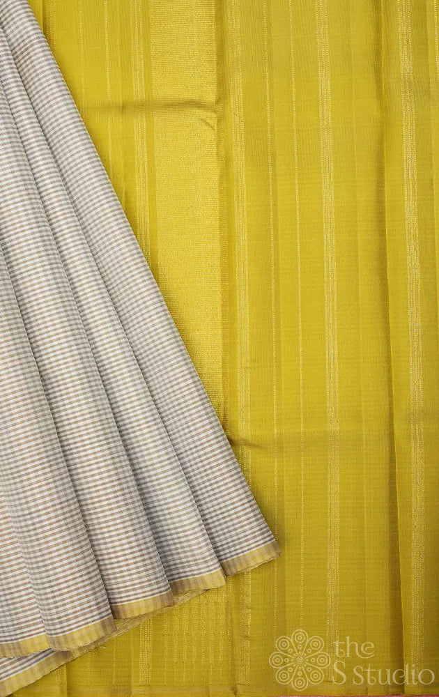 Off white kanchi silk saree with light green checks