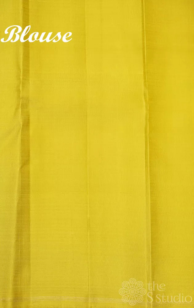 Off white kanchi silk saree with light green checks