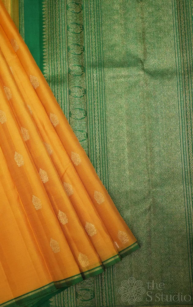 Mustard yellow kora Kanchipuram silk saree with zari buttas
