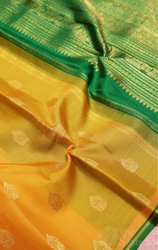 Mustard yellow kora Kanchipuram silk saree with zari buttas