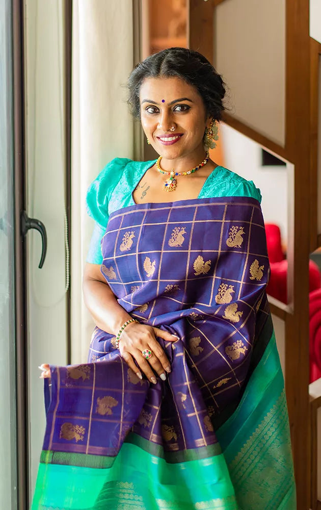 Aubergine colour kanchi pattu saree with checks and buttas