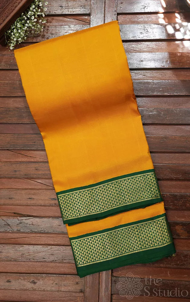 Mustard madisar kanchipuram silk saree with korvai green border