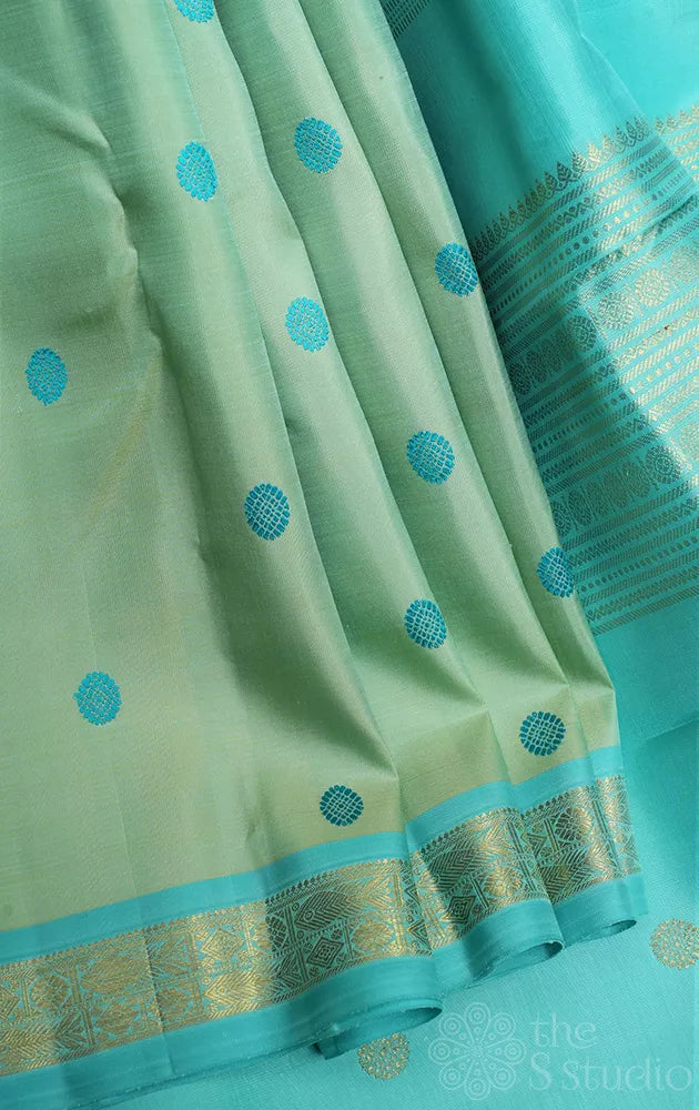 Light pista green small border kanchi silk saree with thread buttas