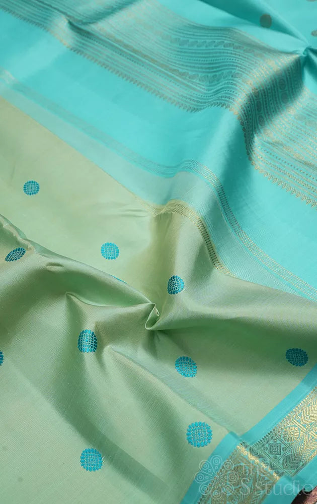 Light pista green small border kanchi silk saree with thread buttas