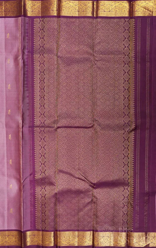 Lavender kanchipuram silk saree with deep purple korvai small border