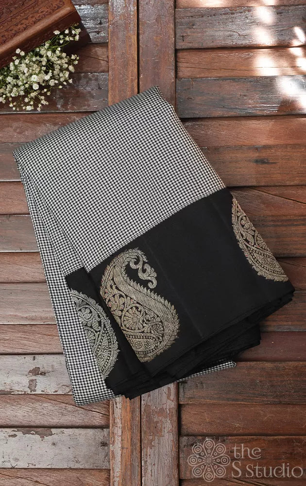 Black and white kasa kasa kattam kanchipuram silk saree with korvai black border