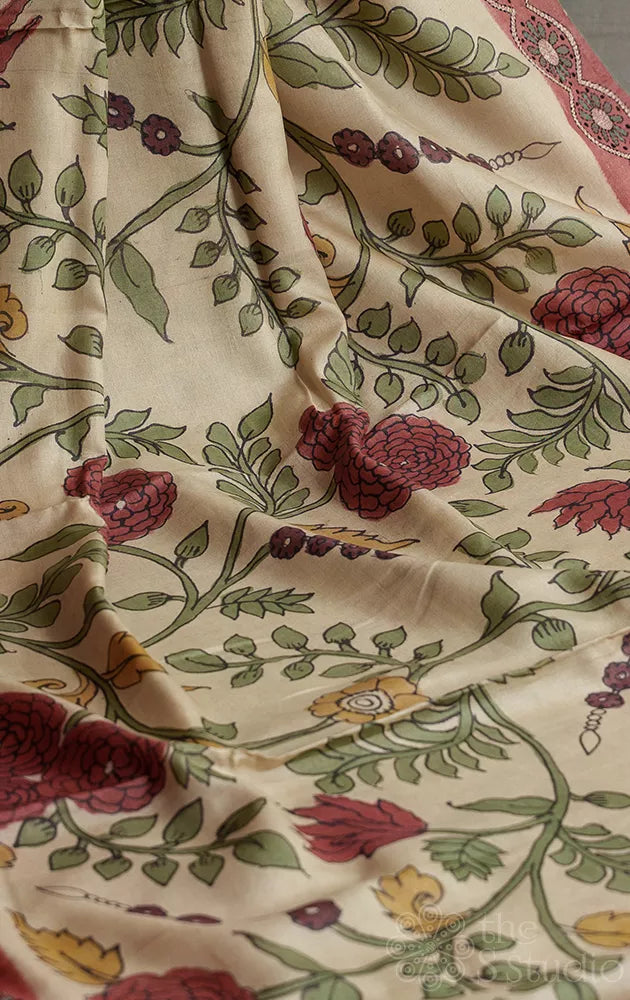 Beige colour tussar kalamkari saree with hand embroidery border