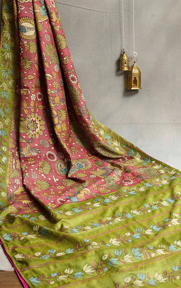 Madder red colour tussar kalamkari saree with green hand embroidered border