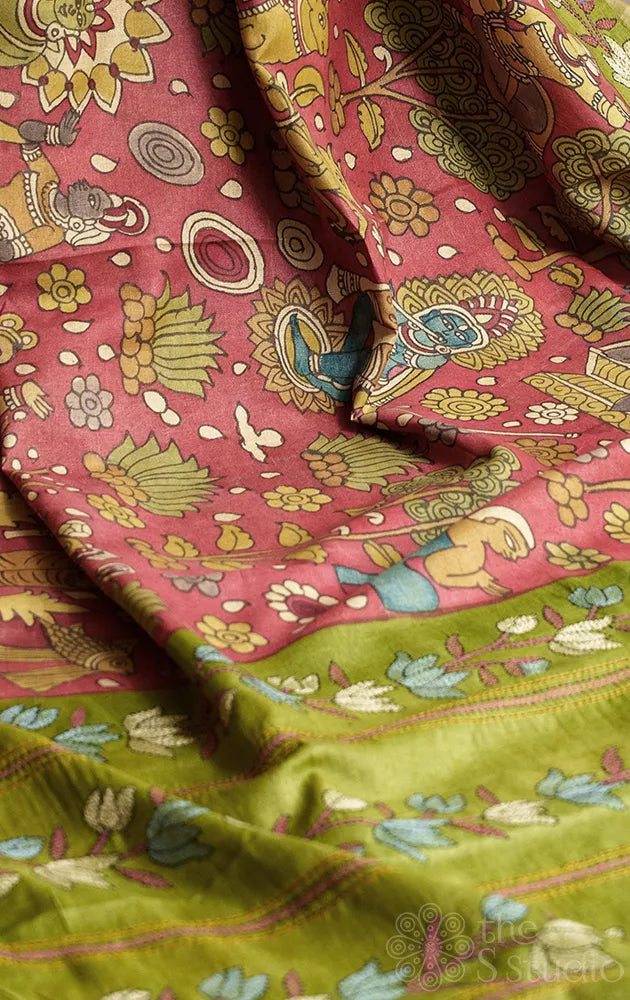 Madder red colour tussar kalamkari saree with green hand embroidered border