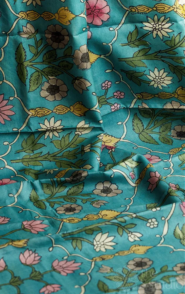 Blue tussar kalamkari saree with off white hand embroidery border