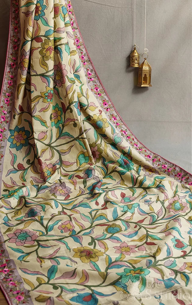 Off white tussar hand painted pen kalamkari saree with French knot hand embroidered border