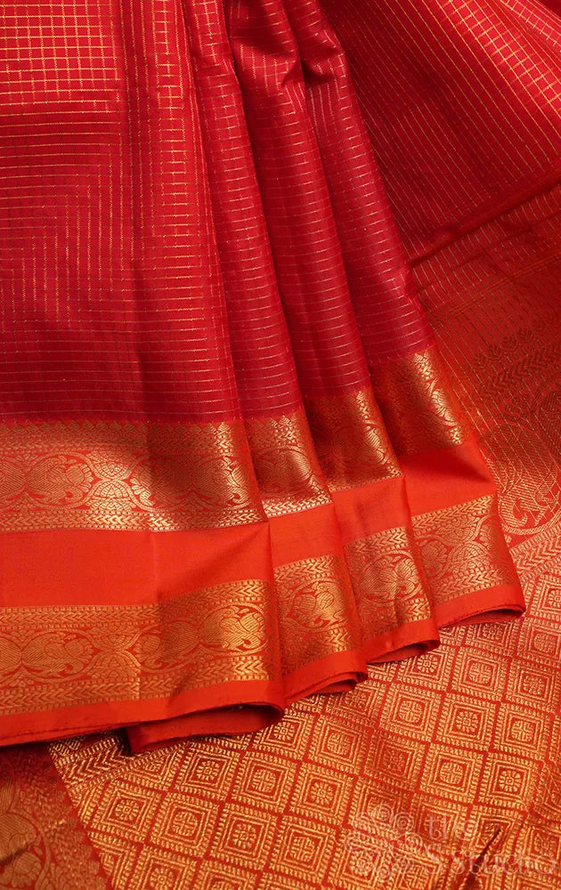 Reddish orange zari checked madisar 10 yards kanchi silk saree with light orange border
