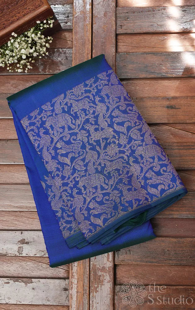 Peacock blue kanjivaram silk saree with vanasingharam border and pallu