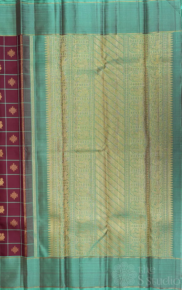 Brown zari checked kanchipuram silk saree with teal green border
