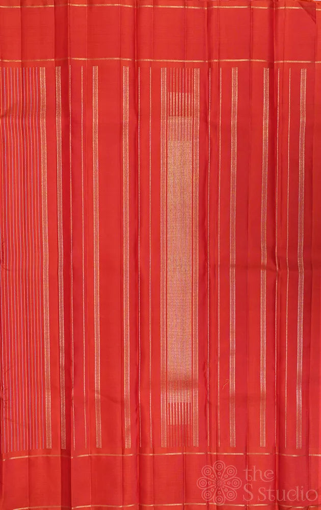 Rust kanjivaram silk saree with thread lines and simple zari border