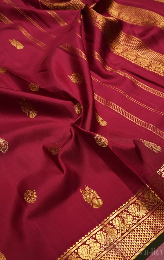 Maroon butta woven madisar 10 yards kanchipuram silk saree with peacock woven border