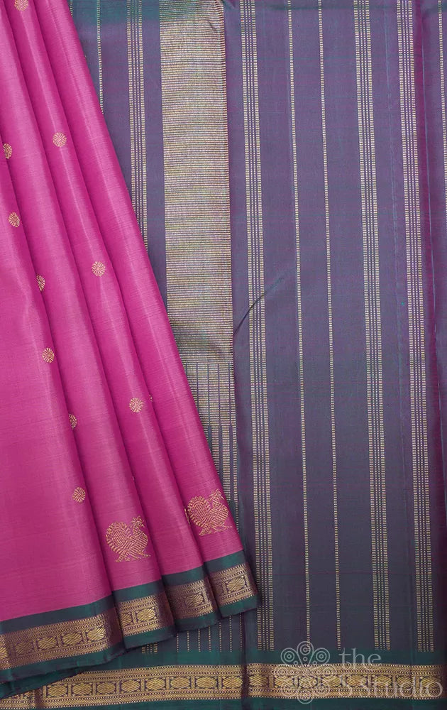 Lotus pink kanjivaram silk saree with small peacock blue border