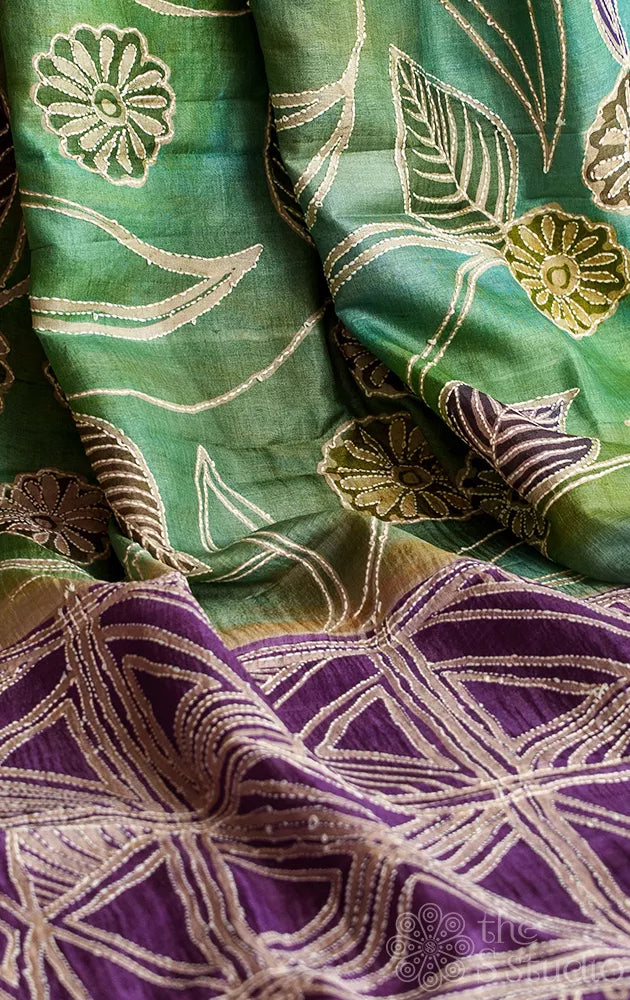 Shades of green and blue tussar silk saree with hand batik print