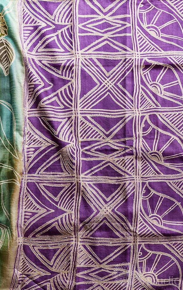 Shades of green and blue tussar silk saree with hand batik print