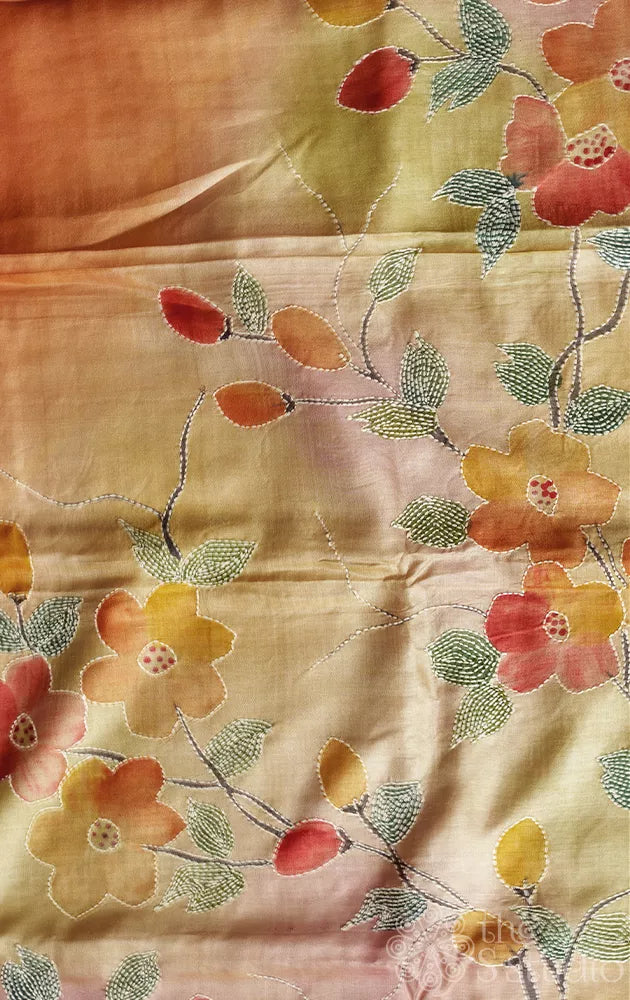 Shades of peach and light yellow tussar silk saree with batik print
