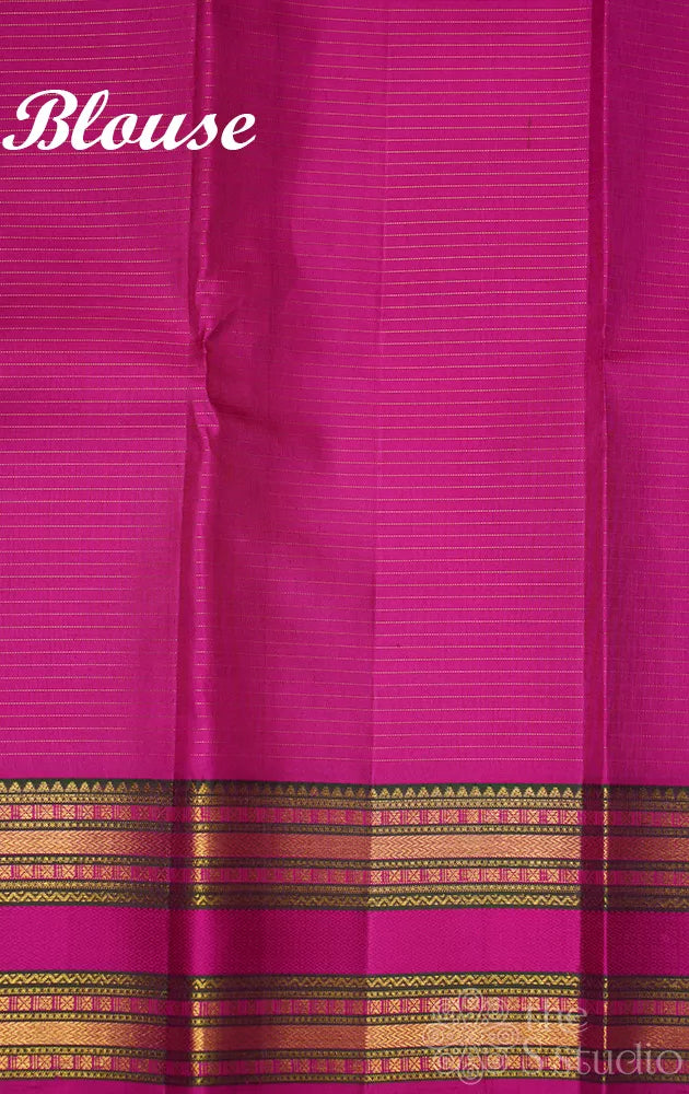 Lavender kanjivaram silk saree with rani pink rettaipet border