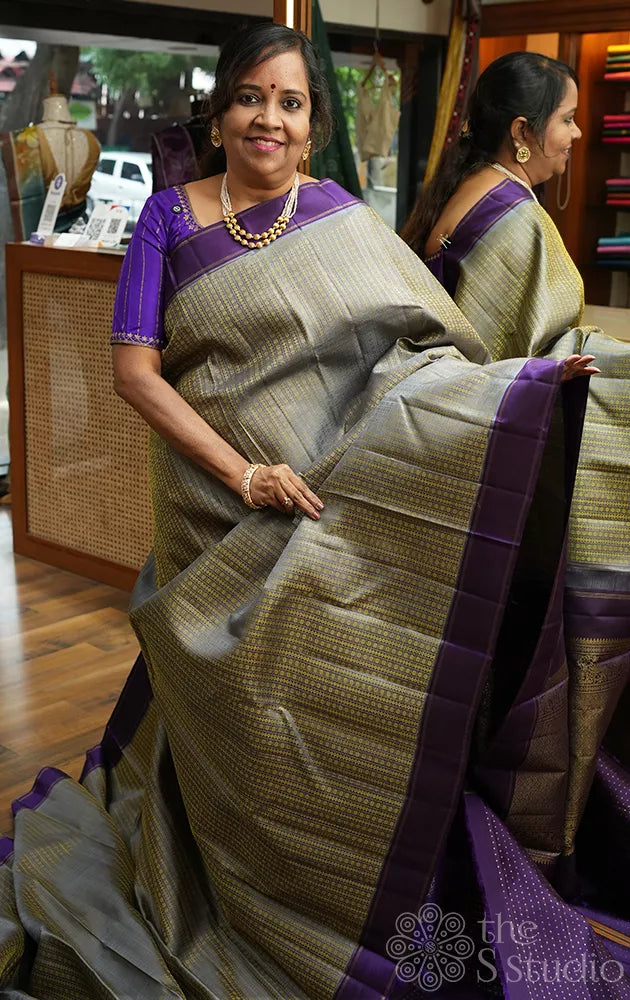 Light grey thread woven kanchi silk saree with violet border