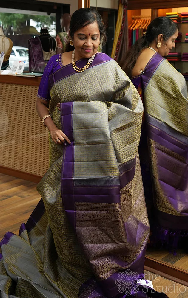 Light grey thread woven kanchi silk saree with violet border