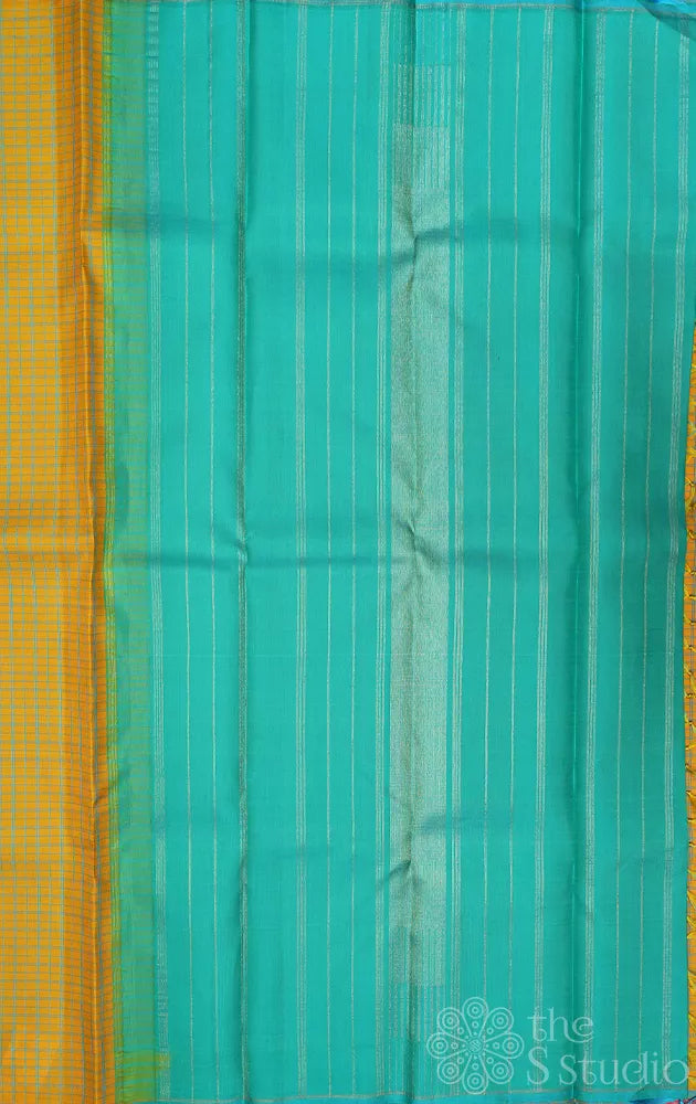 Yellow borderless kanchi pattu saree with blue checks