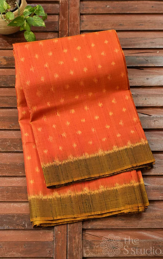 Orangish peach patola raw silk saree with pichwai design woven pallu
