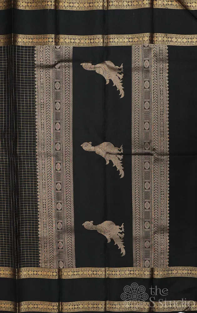 Black kanchipuram silk saree with zari checks and  rettaipet border
