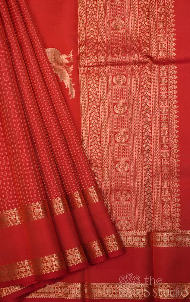 Rust checked kanjeevaram silk saree with rettaipet zari border