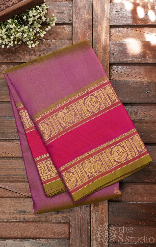 Pinkish green kanchi silk saree with rettaipet border and kili motifs pallu