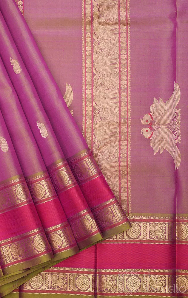 Pinkish green kanchi silk saree with rettaipet border and kili motifs pallu