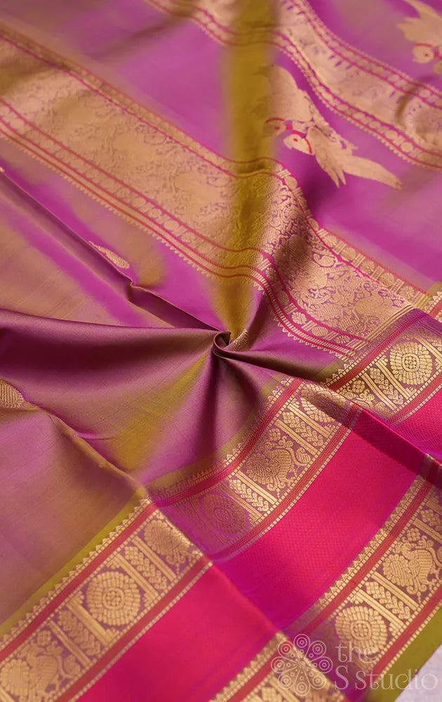 Pinkish green kanchi silk saree with rettaipet border and kili motifs pallu