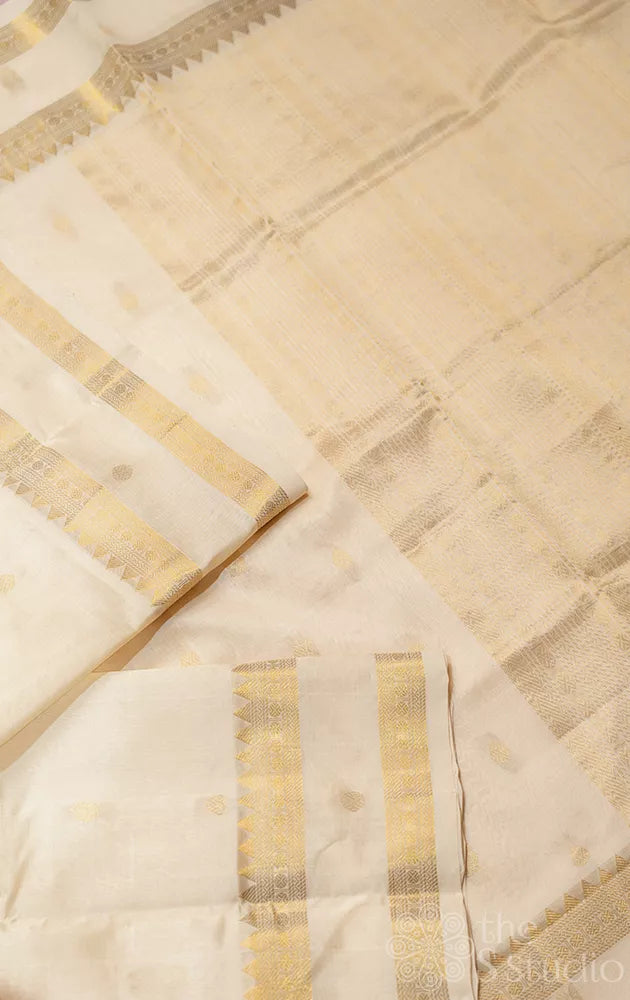 Off white silk cotton saree with rettaipet zari border