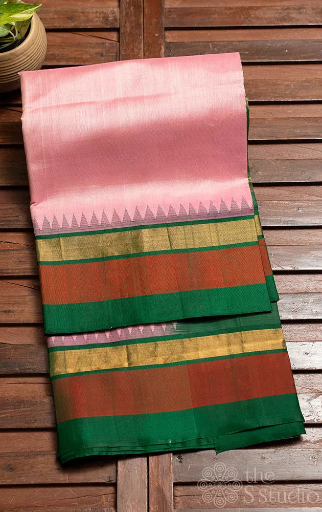 Light pink silk cotton saree with korvai temple border