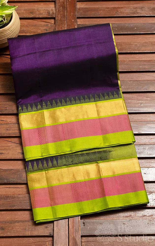 Violet silk cotton saree with green korvai border