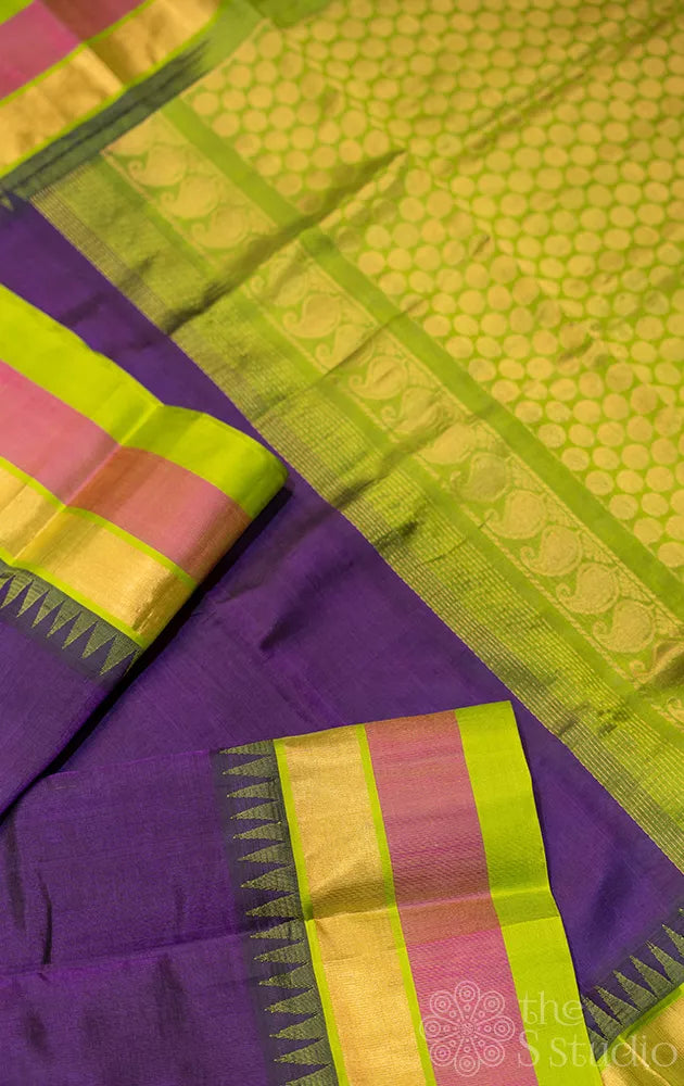 Violet silk cotton saree with green korvai border