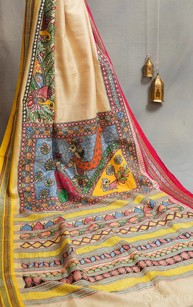 Beige vidharbha tussar silk saree with rani pink and yellow ganga jamuna border and madhubani hand painting