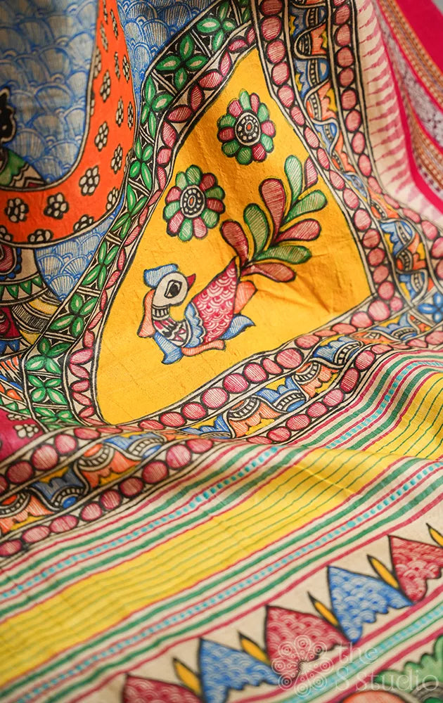 Beige vidharbha tussar silk saree with rani pink and yellow ganga jamuna border and madhubani hand painting