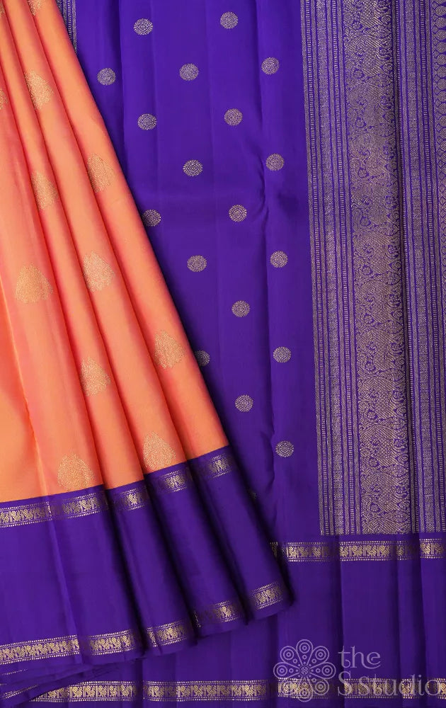 Light orange kanjivaram silk saree with korvai violet border