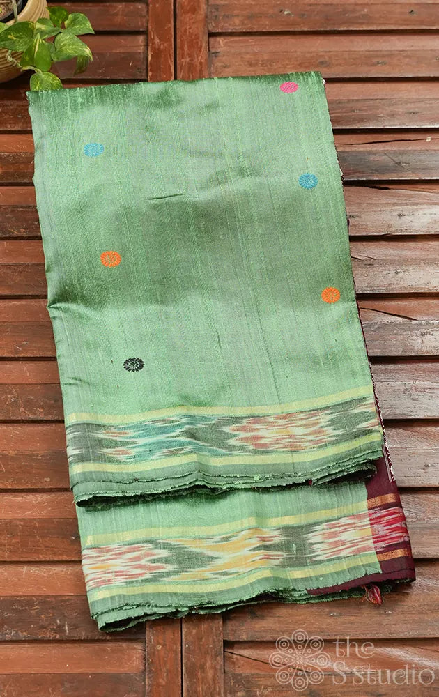 Light green raw silk saree with dolabedi design pallu
