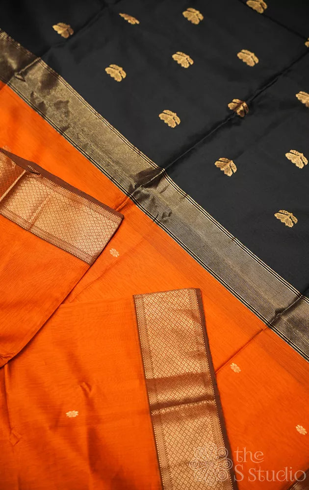 Rust maheshwari silk cotton saree with black pallu